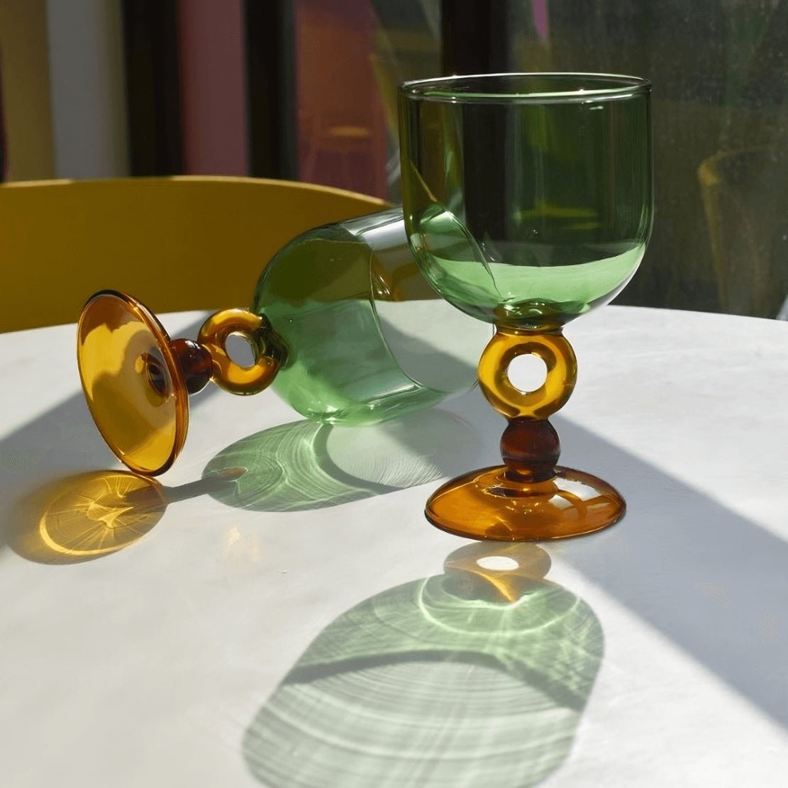Green glass amber circle stem wine glass goblet