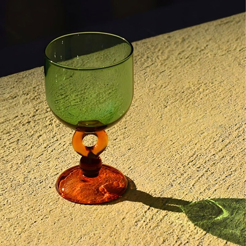 Green glass with a circle amber stem goblet