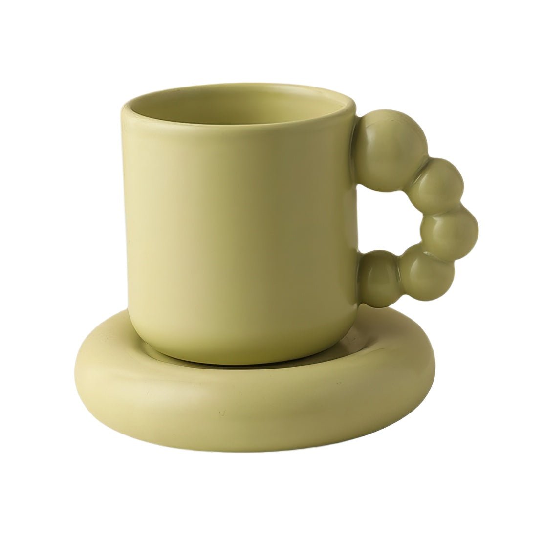Green, ceramic pearl handle mug with matching saucer
