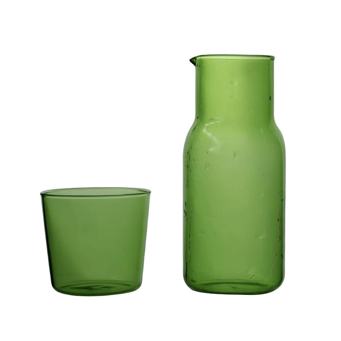 Green glass water can with matching drinking cup lid