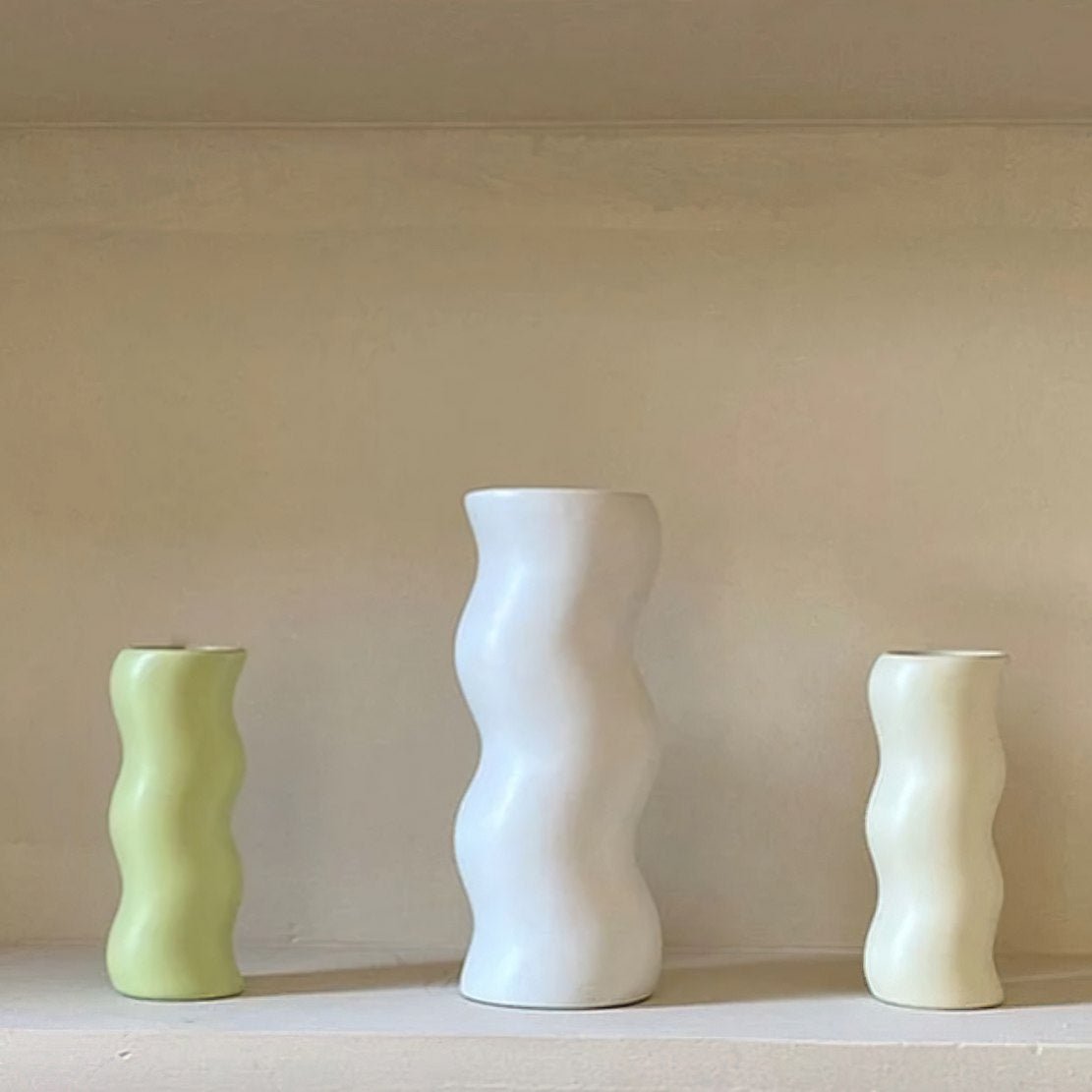 Green, white and beige ceramic wiggle vases