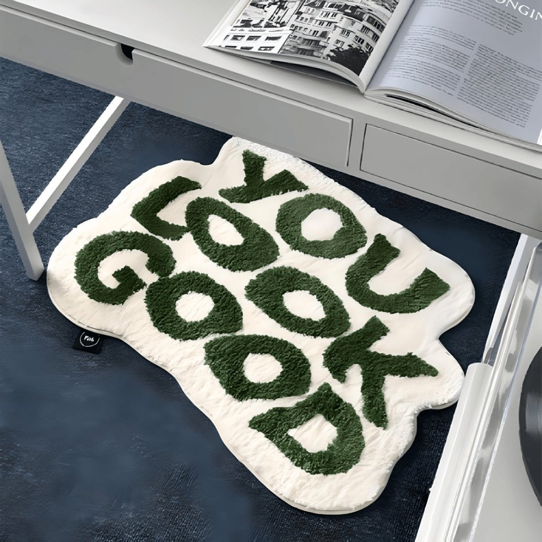 Green & white "You Look Good" text floor rug