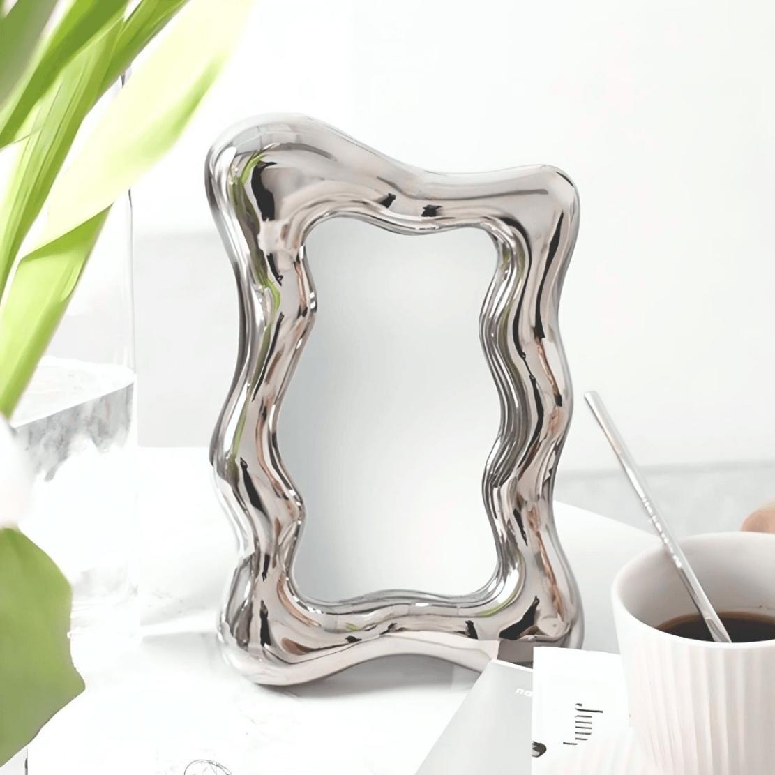 Groovy silver irregular frame table mirror