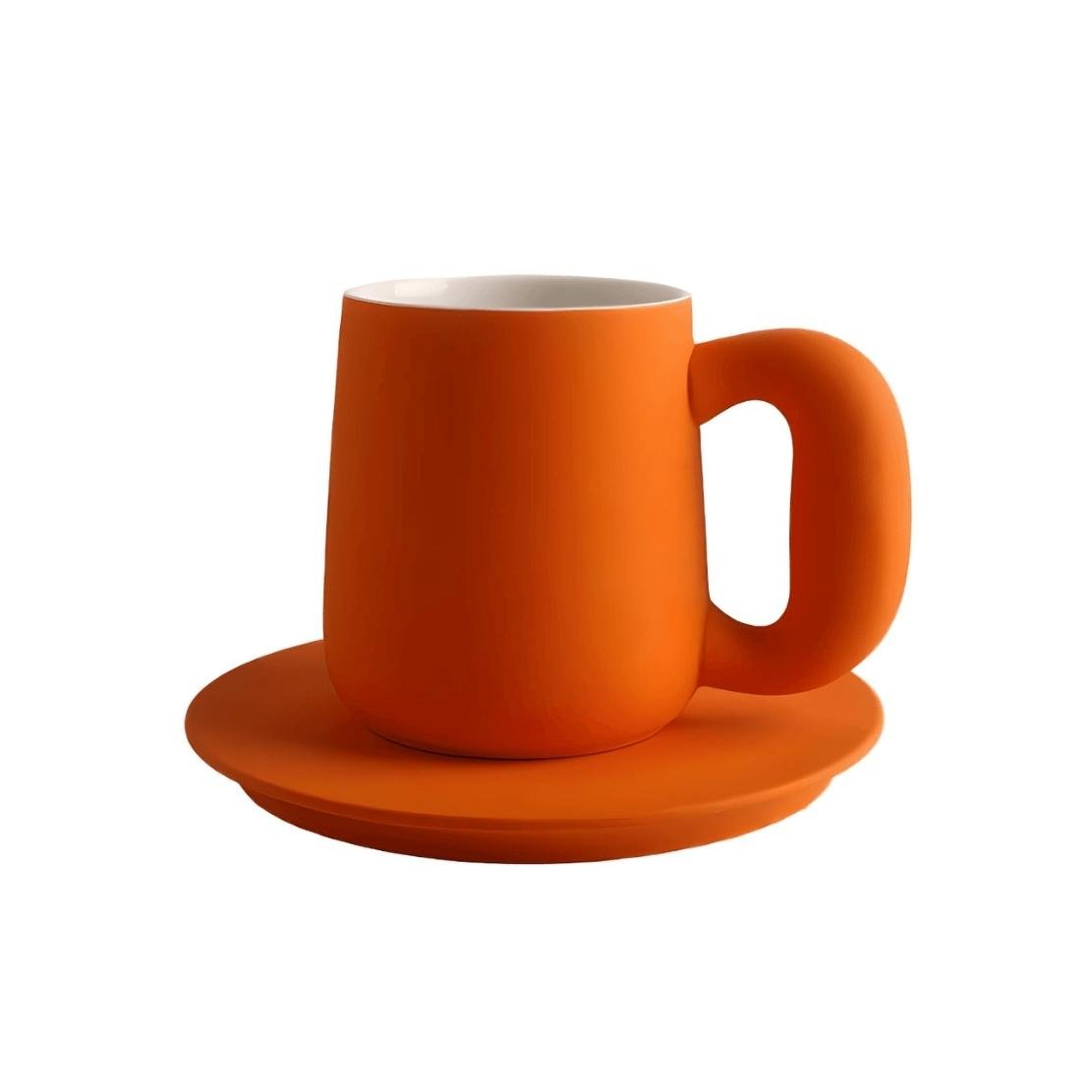 Groovy orange ceramic mug with saucer
