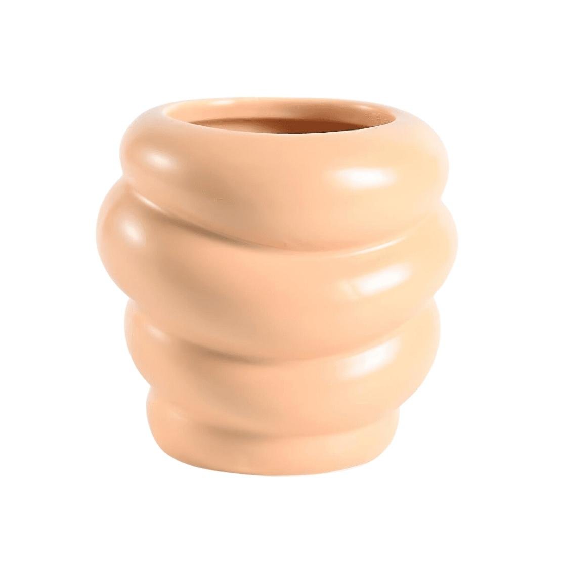 Low, orange ceramic honeycomb vase