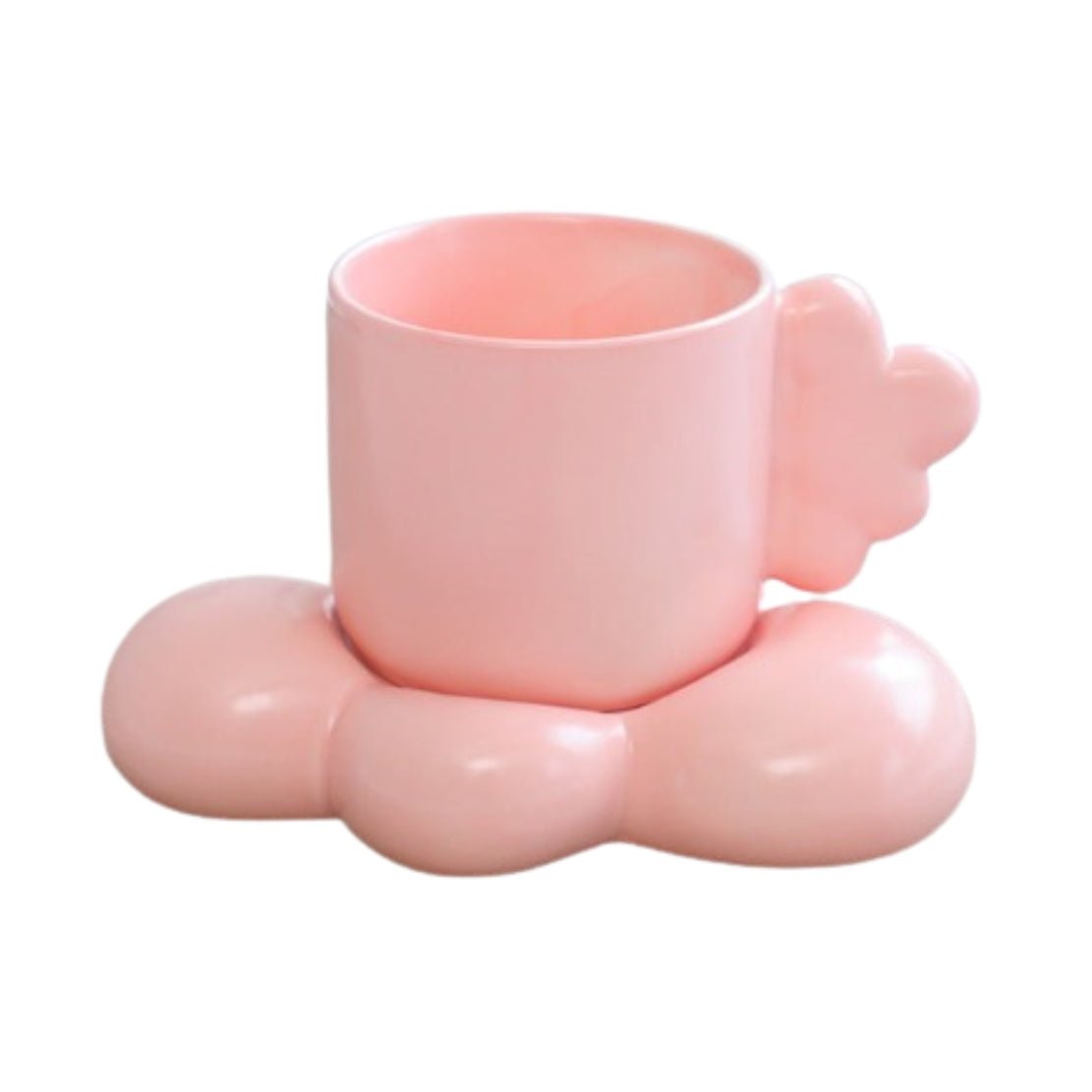 Pink ceramic mug with cloud handle and saucer
