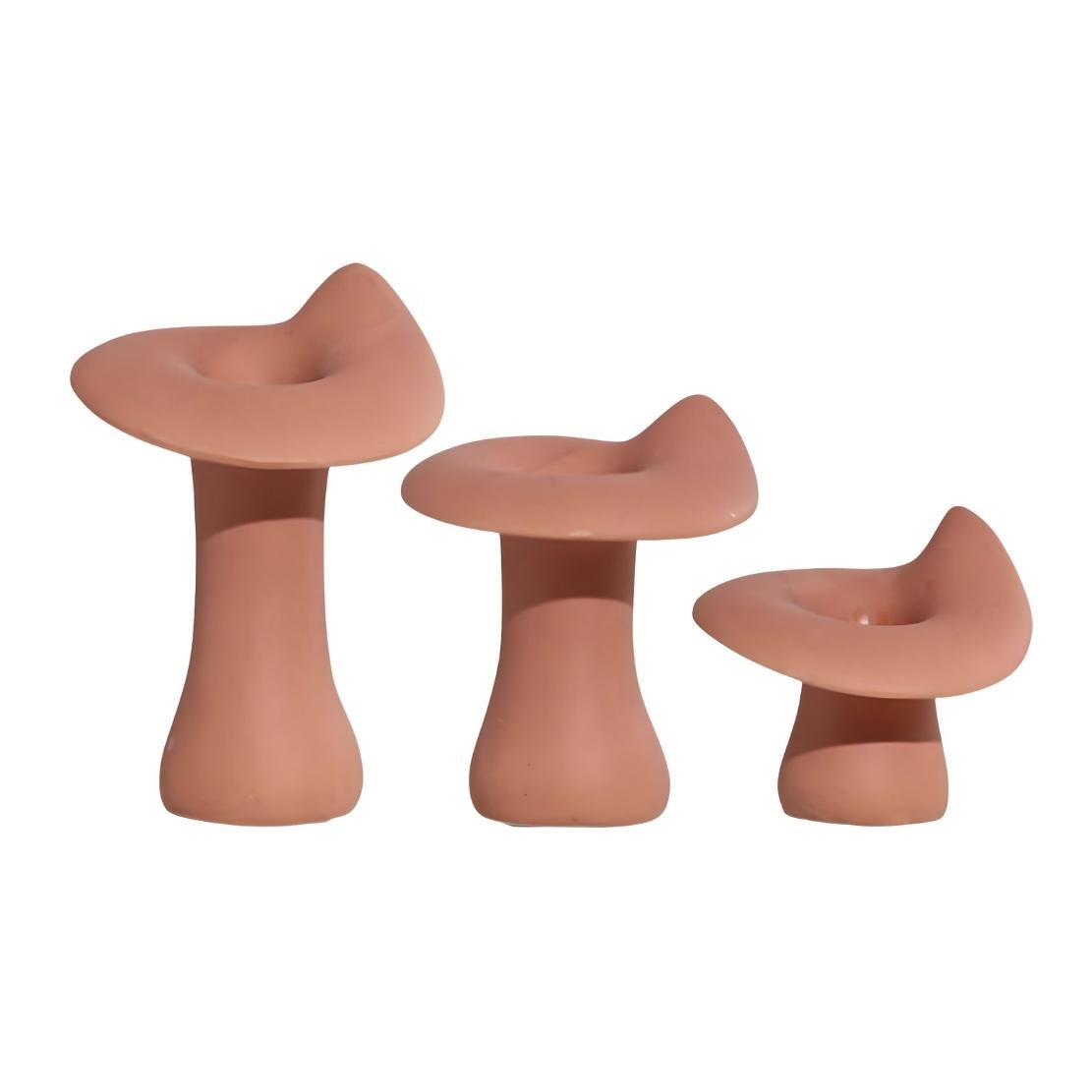 Pink, ceramic mushroom design candlestick holders in three sizes