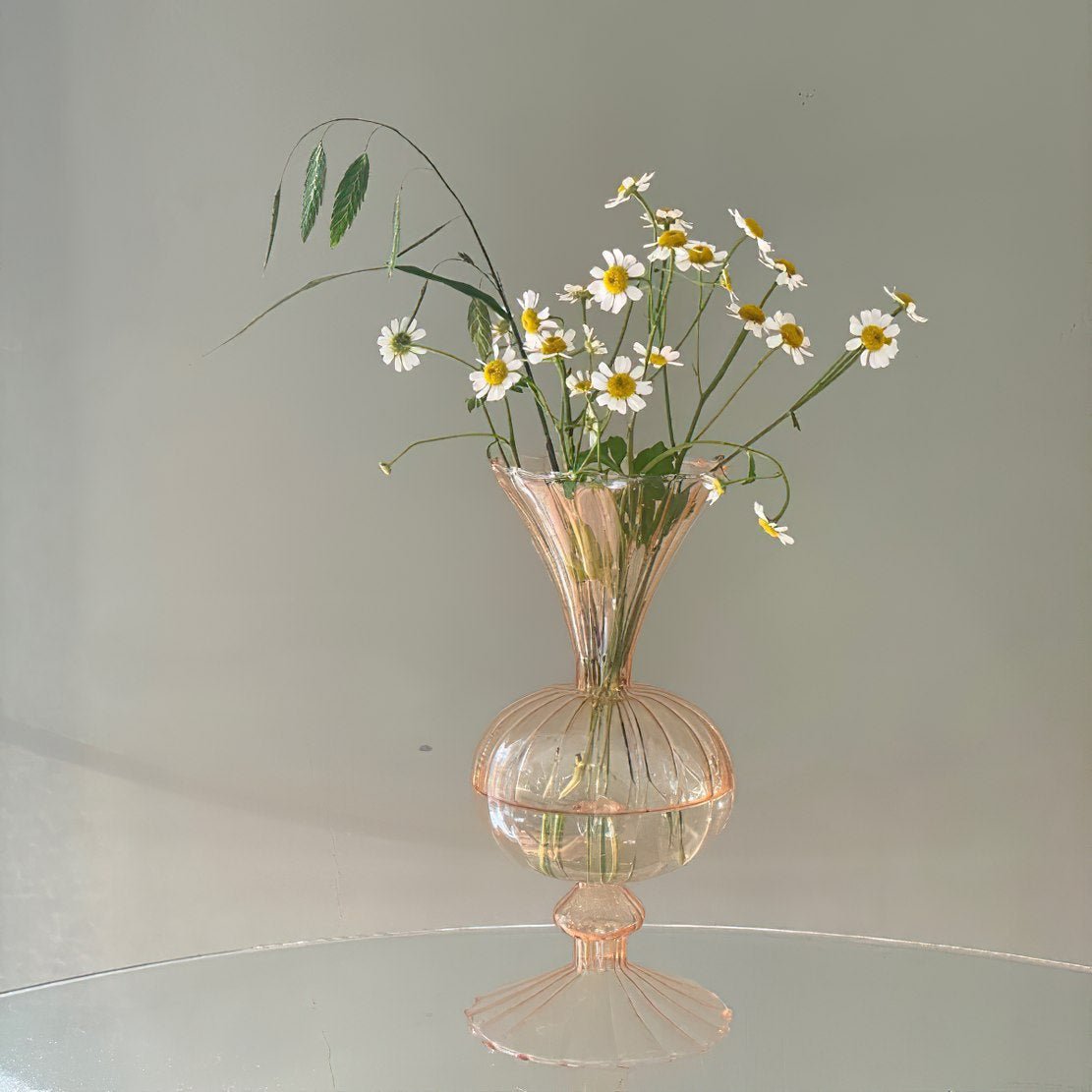Orange classic romantic glass vase with white flowers