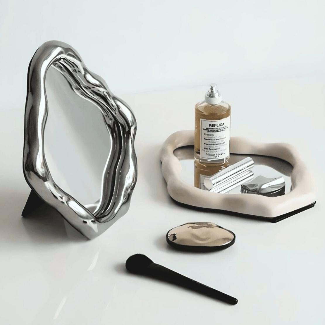 asymmetrical silver vanity decor mirrors.