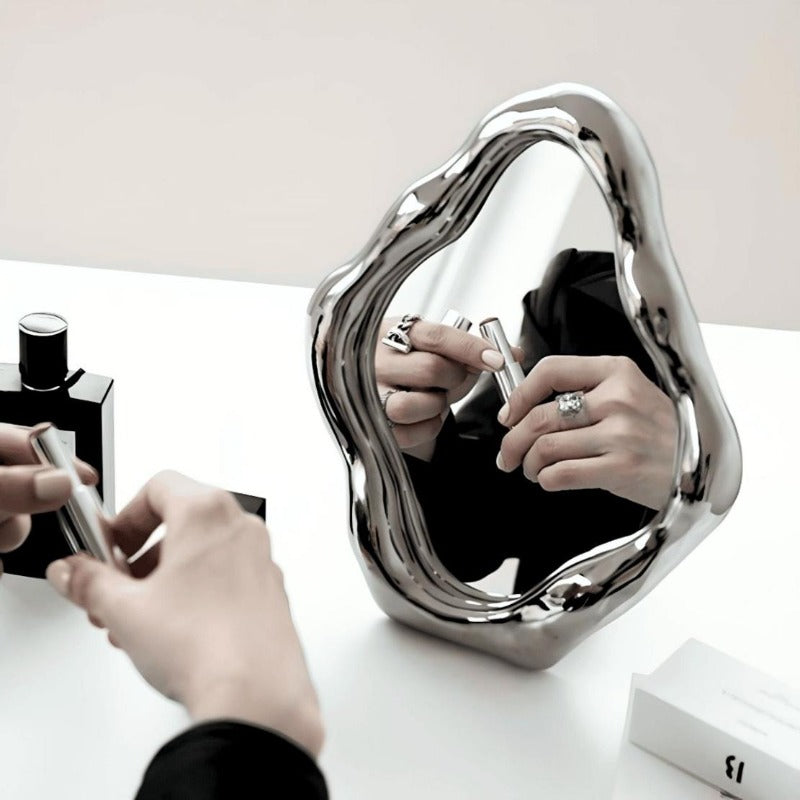 irregular silver desktop vanity makeup mirror.