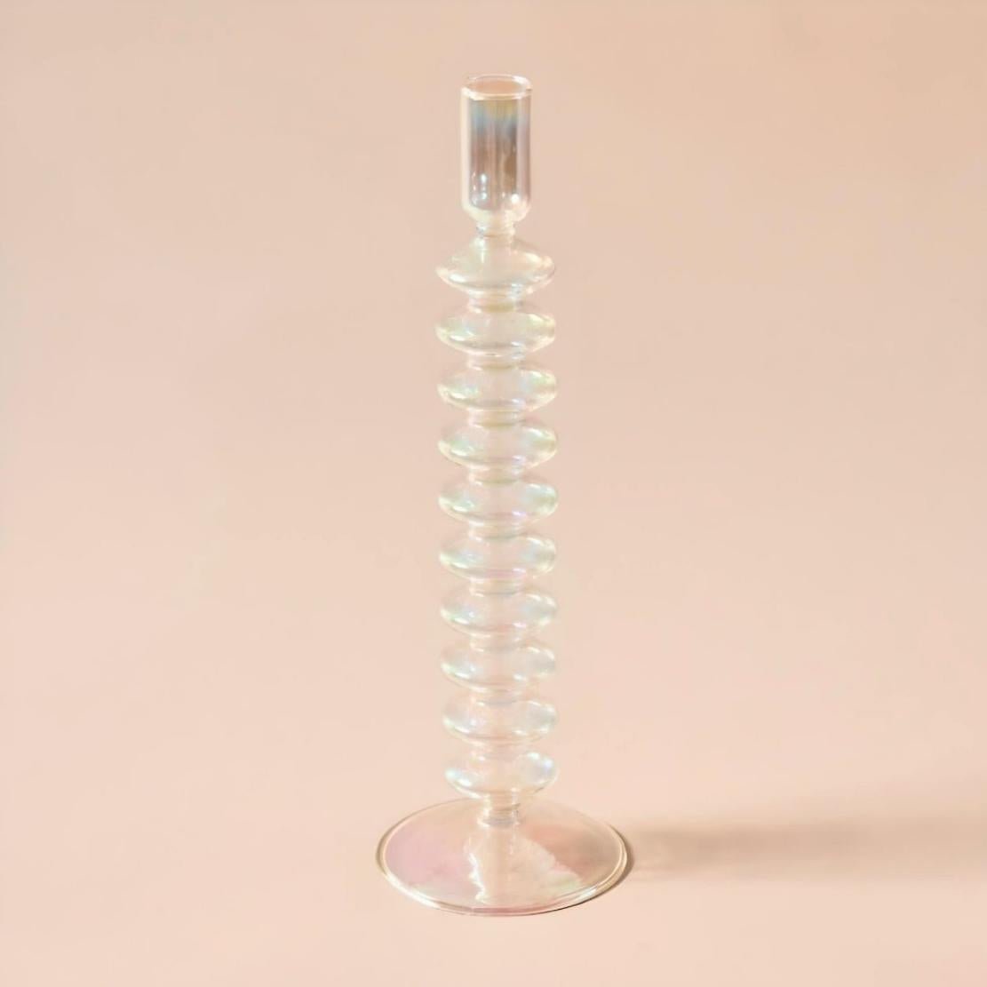 Tall, glass rippled candlestick holder