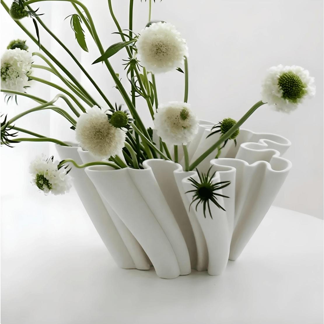Large, white, wavy, ceramic ornament bowl with flowers