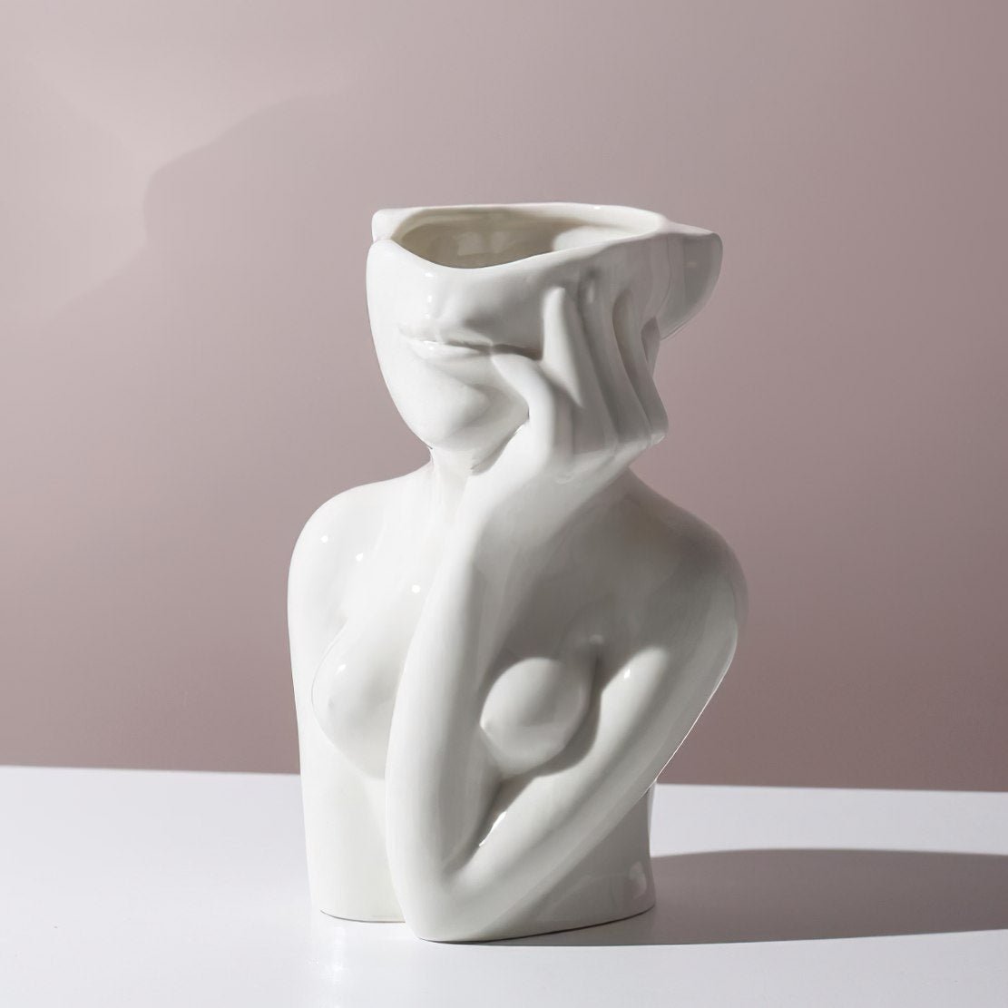 Wondering woman white ceramic female face hand vase