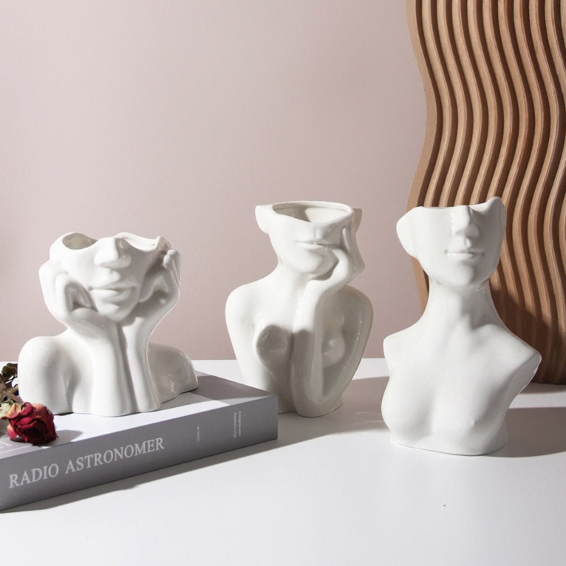 White, ceramic, elegant female face vases