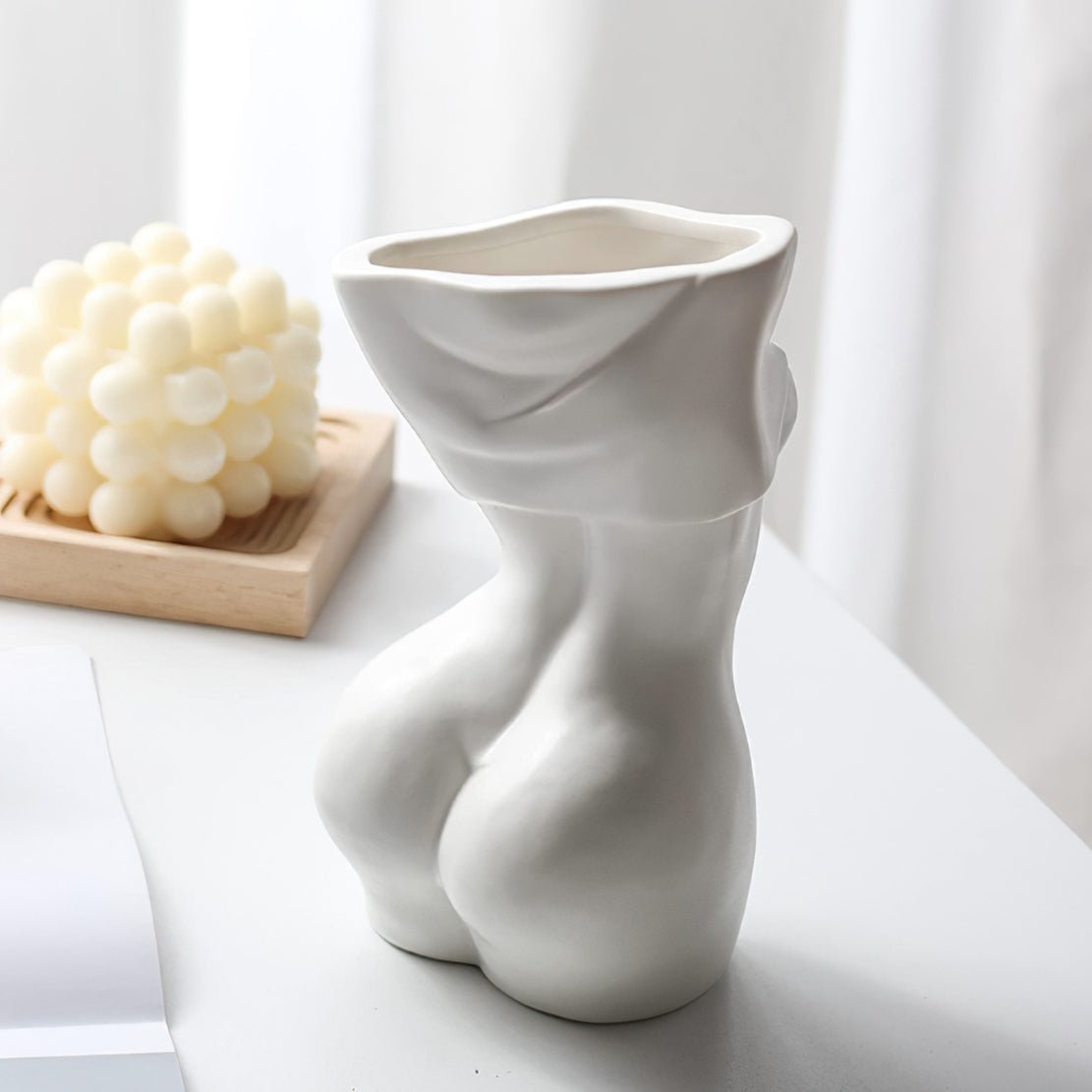 White, ceramic, female body vase