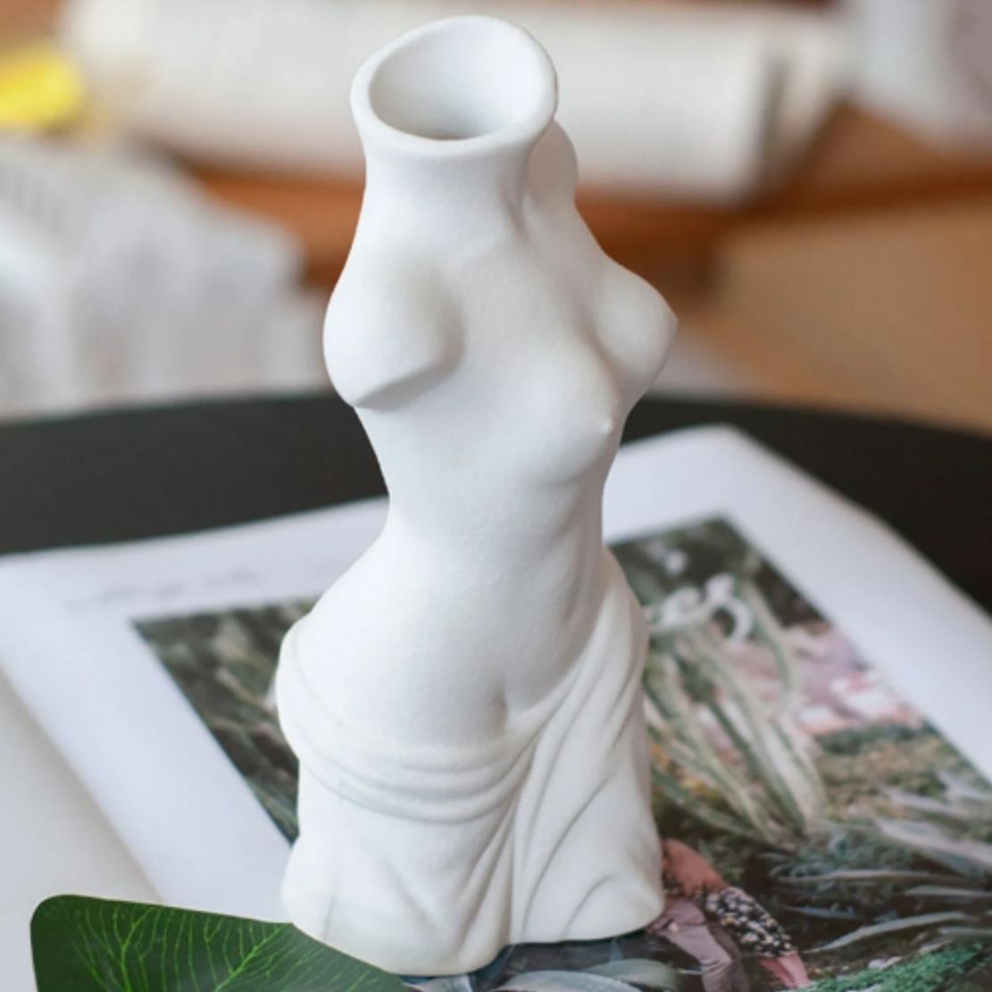 White, ceramic Venus statue body vase