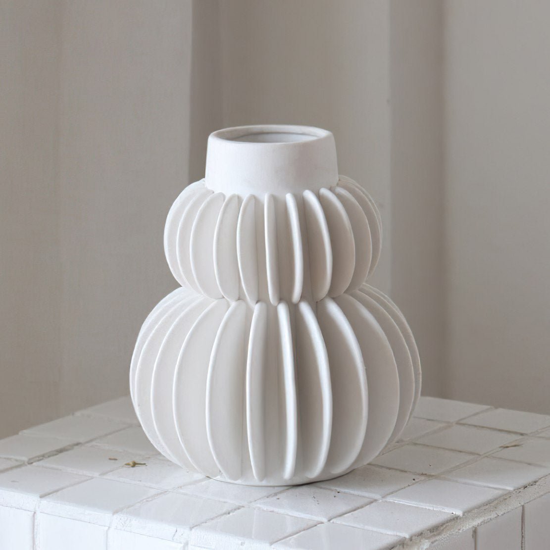White, ceramic line ball vase