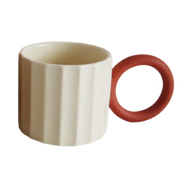 White ceramic mug with a large, red circle handle