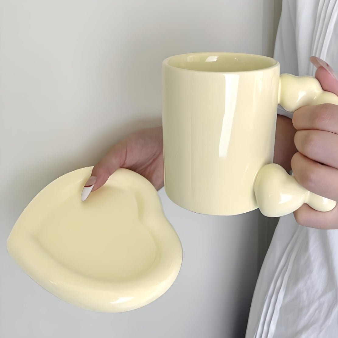 Yellow ceramic heart handle mug & saucer
